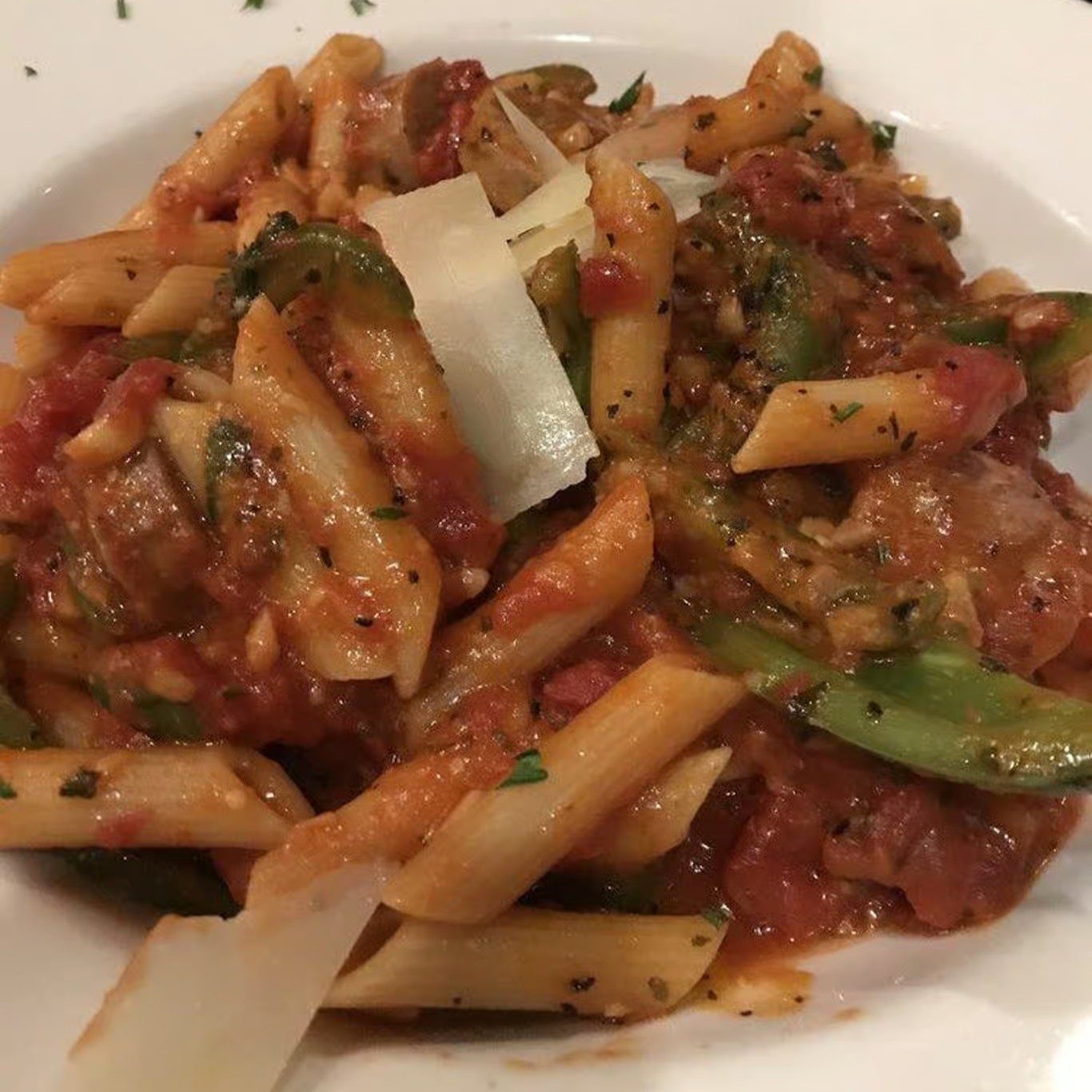 Sausage & Peppers Over Ziti.