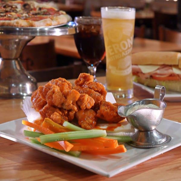 Mercato's Italian Grill: a plate of buffalo wings with carrots, celery, and dipping sauce.
